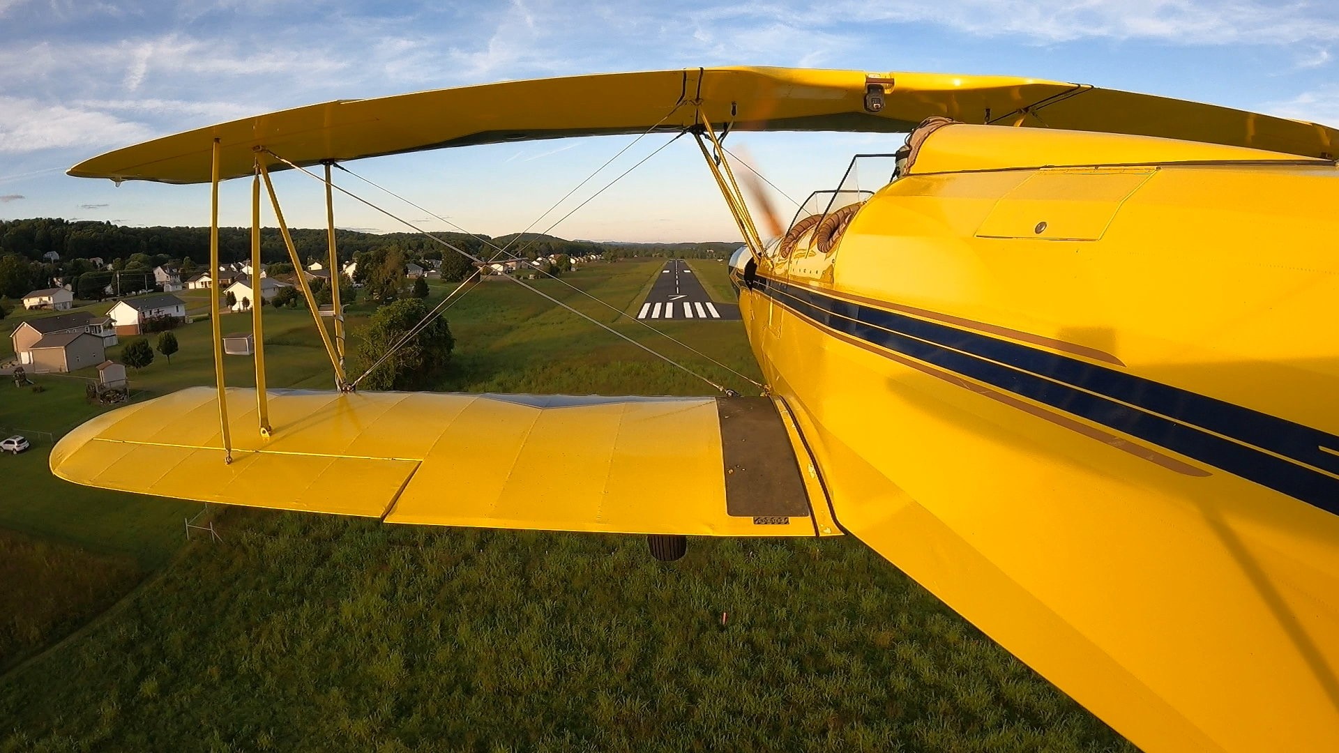 Hawkins County Airport Aerial Shot Yellow Airplane Flying Toward Runway